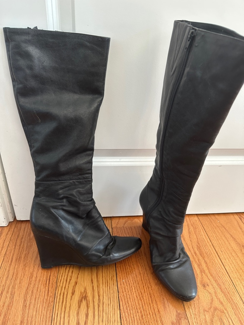 Pegabo Black Wedge Knee-High Boots - Sleek Leather Design